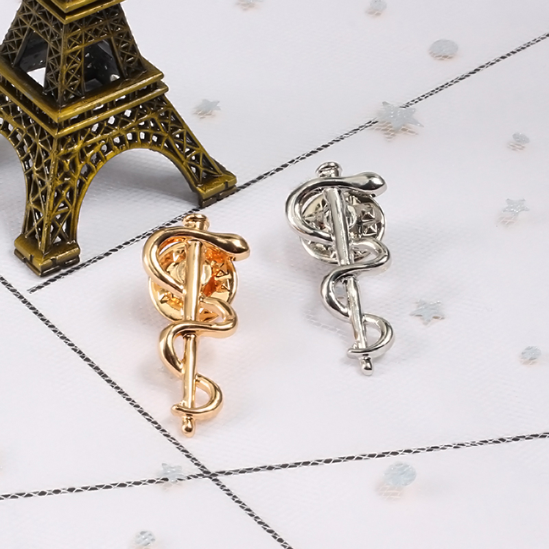 Broche serpent Caduceus avec L - Health Wellness Logo avis et prix