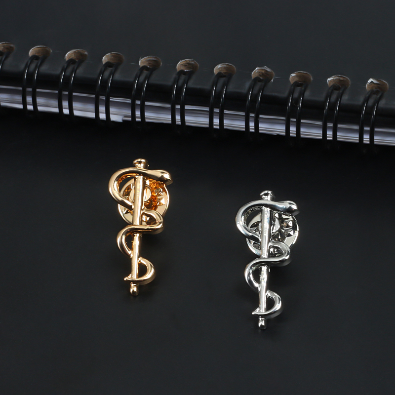 Broche serpent Caduceus avec L - Health Wellness Logo avis et prix
